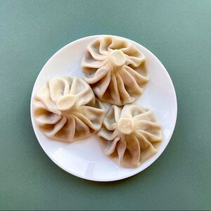 Хинкали с сулугуни и тархуном 