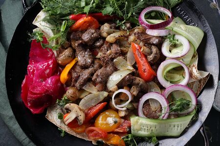 Садж из говядины с овощами на компанию