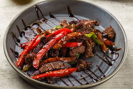 Мясной горячий салат