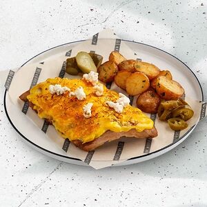 Свиные ребра под сырным соусом