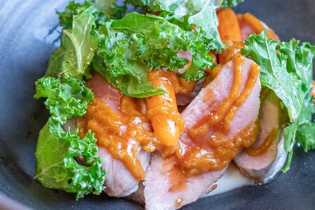 Утиное филе с кремом из сельдерея, молодой морковью и соусом хойсин