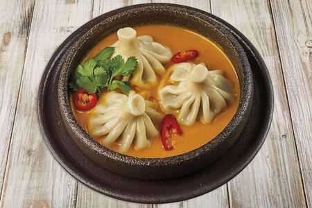 Хинкали в соусе том ям