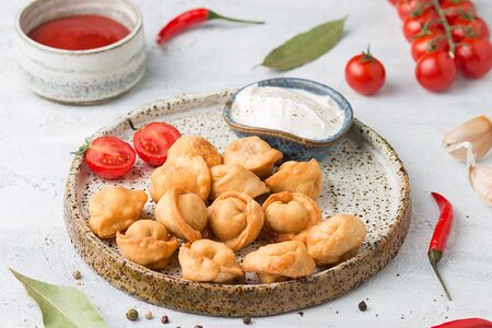 Пельмени жареные