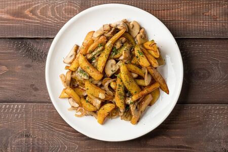 Картофель, жаренный с грибами