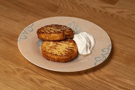 Сырники со сметаной