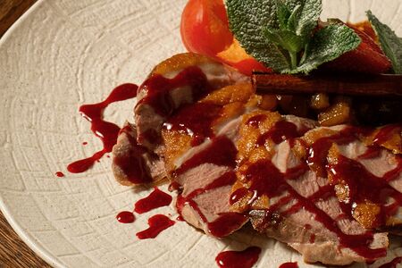 Утиная грудка с Рататуем из груши под вишнёвым соусом