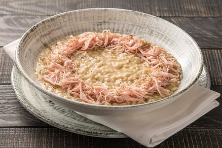 Ризотто с мортаделлой, черным перцем, пекорино и трюфелем