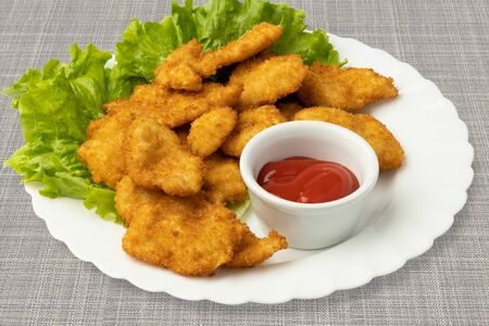Наггетсы куриные с кетчупом
