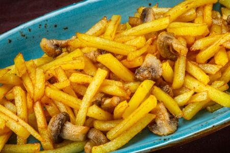 Картофель, жаренный с грибами