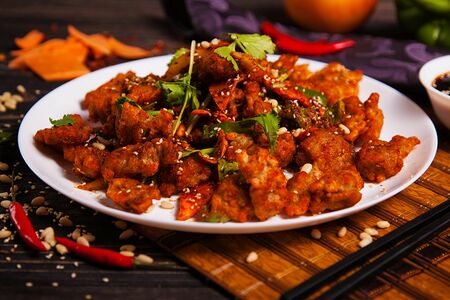 Свинина в кляре с кедровыми орешками