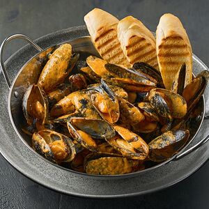 Мидии в соусе том ям