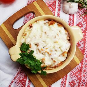 Пельмени, запеченные с ветчиной и сыром