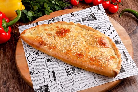 Кальцоне с ветчиной