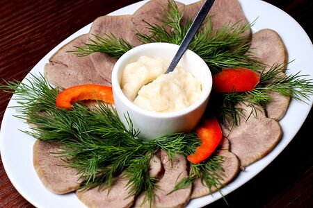 Язык отварной с хреном