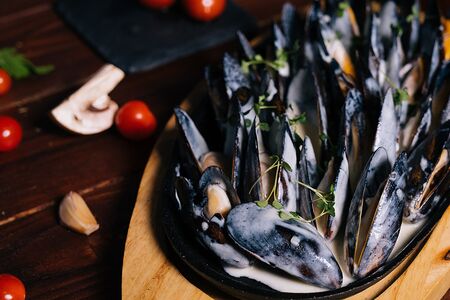 Мидии в сливочном соусе