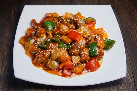 Свинина в кисло-сладком соусе с ананасом