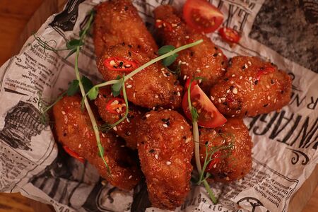 Острые куриные крылья в панировке