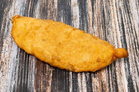 Жареный пирожок с картофелем