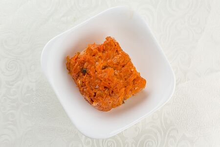 Рыба под овощами