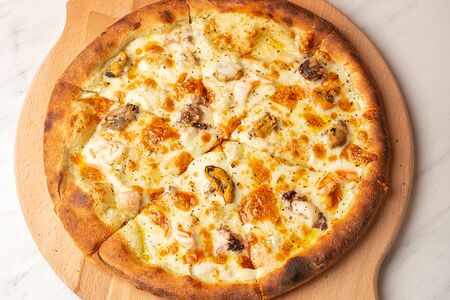 Пицца с морепродуктами