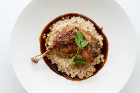 Утиная ножка конфи с овсяной кашей