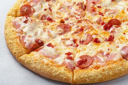 Пицца Прошутто формаджио на толстом с сыром