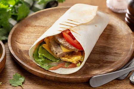 Утренняя лепешка с свиной котлетой и яйцом