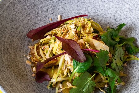 Салат с молодой капустой и битыми огурцами