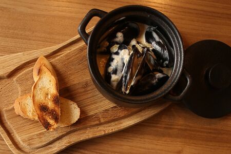 Мидии в сливочном соусе