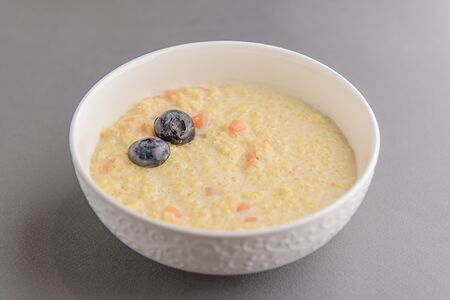 Пшенная каша с карамельной тыквой и сливочным маслом