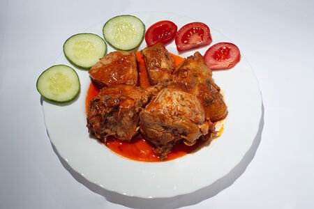 Курица в томатном соусе