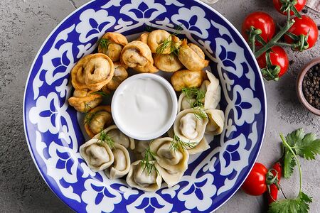 Домашние пельмени жареные