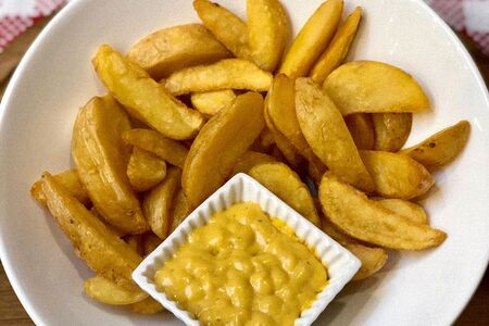 Картофельные дольки по-деревенски