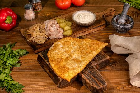 Чебурек с курицей в грибном соусе