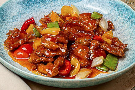 Свиные кусочки в кисло-сладком соусе