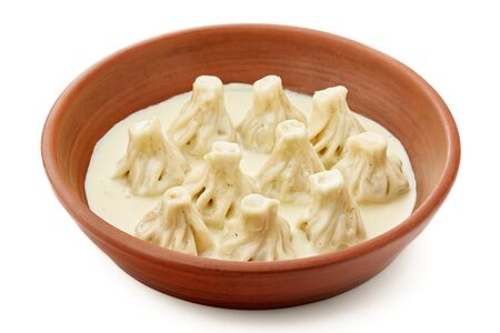 Мини-хинкали с курицей в сырном соусе