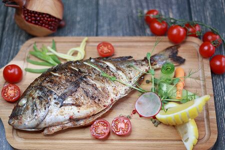 Дорадо на мангале