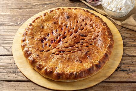 Осетинский пирог с творогом и вишней