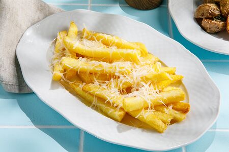 Картофель фри с пармезаном и трюфельным маслом