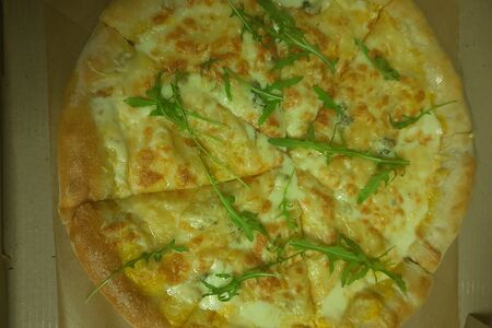 Пицца четыре сыра