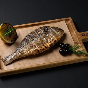 Дорадо, запеченная с прованскими травами