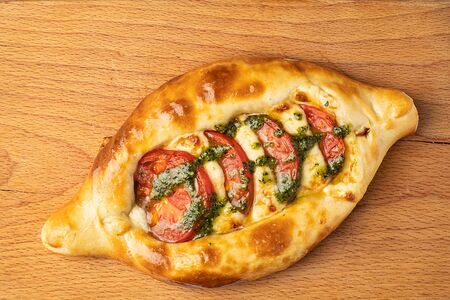 Аджарик с помидорами и сулугуни