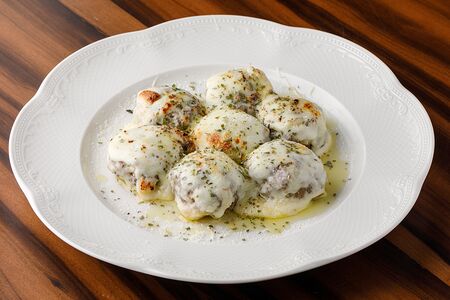 Котлетки по-милански, запечённые под сыром с орегано