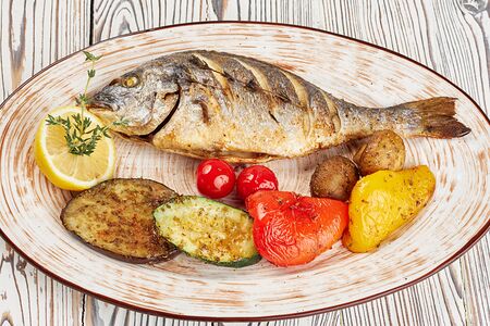 Дорадо с овощами гриль