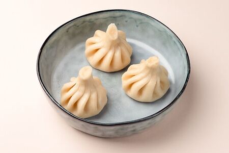 Хинкали с говядиной и сметаной 