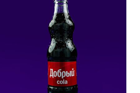 Добрый Cola в стекле