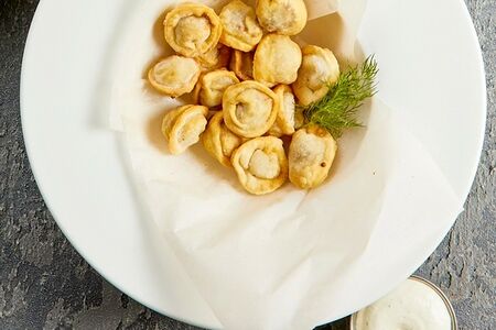 Пельмени жареные