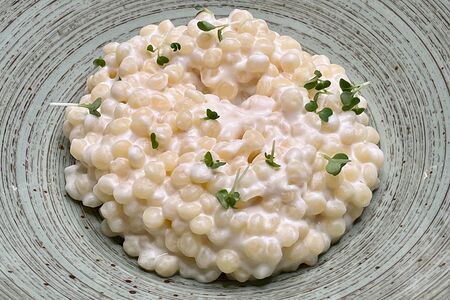 Птитим в сливках с пармезаном