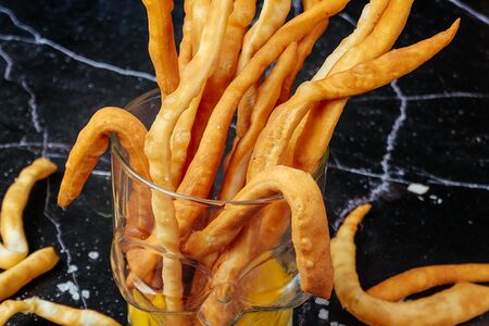 Хворост из теста с соусом Чеддер