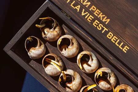 Улитки с апельсином, медом и соевым соусом